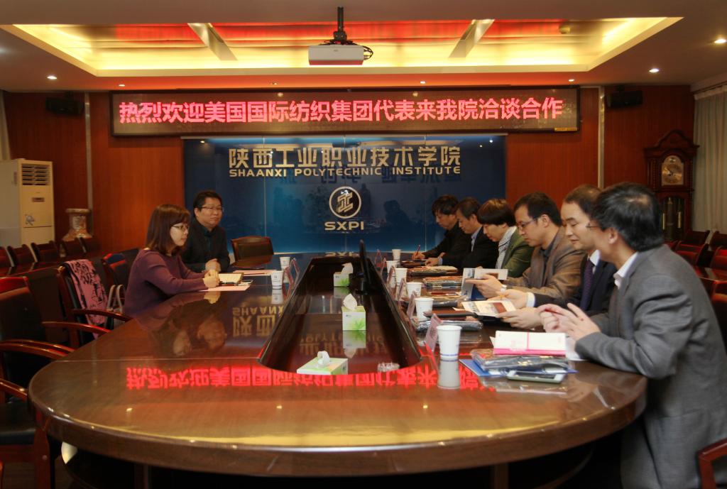 美国国际纺织集团代表来新蒲京官网访问交流